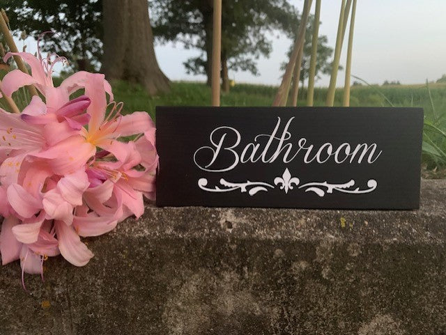 Door sign for the bathroom to provide direction for home or business guests.  