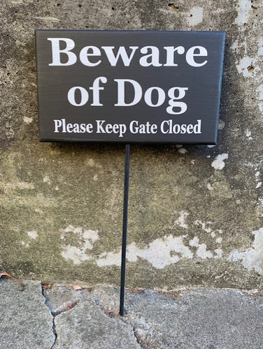 Dog sign beware of dog plaque a stake.  Decorative yard signage for homes or business 