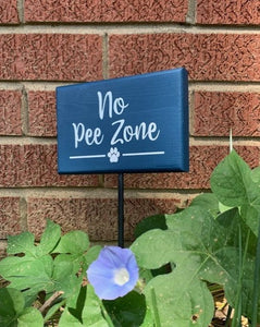 no pee zone sign on a stake for the yard in navy blue 