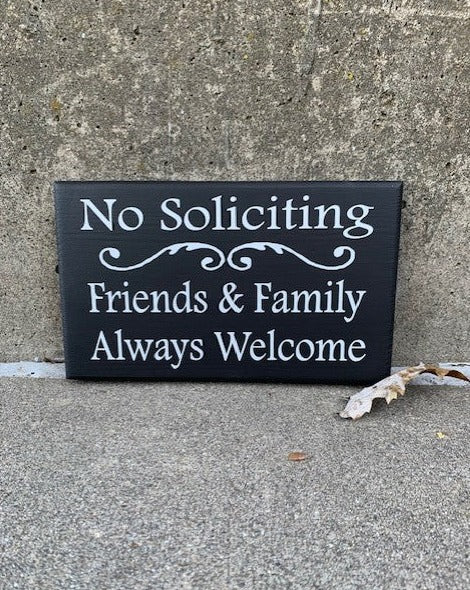 Decorative entry sign No Soliciting Friends & Family Always Welcome.  Let unwanted guests know you are not interested while welcome those closes to you. 