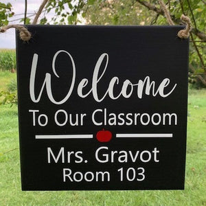 Teacher welcome class room sign provides direction for students and faculty. 