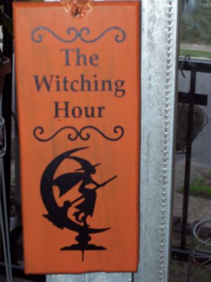 Rustic Halloween decor for your door.  The Witching Hour sign is 9