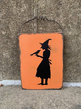 Load image into Gallery viewer, Halloween ornament, handcrafted fall decor with  witch and crow silhouette.  Decorative piece for a wreath or pencil tree or just an seasonal accent on its own. 