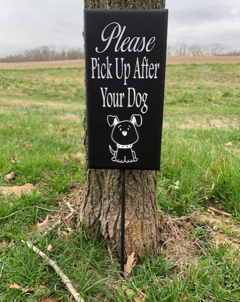 Cute decorative vertical sign that asks your neighbors to please pick up after their dogs. 