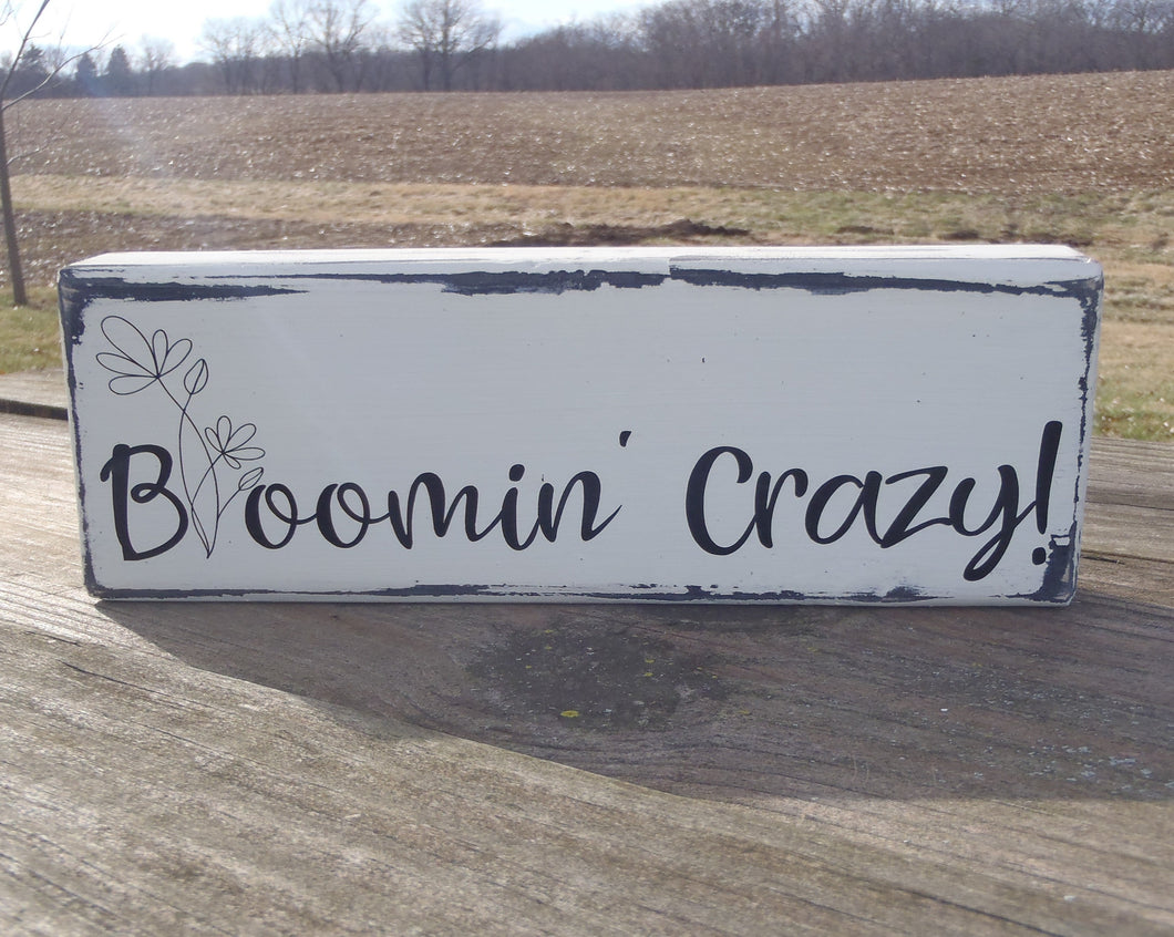 bloomin crazy fun table sign for the home.  Decorative accents around the home that make you and other smile. 