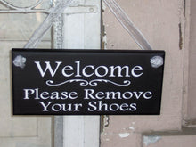 Load image into Gallery viewer, Cute Welcome Sign with a polite remove your shoes message.  Decorative sign to display on the door or the entry wall. 