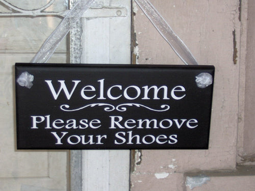 Cute Welcome Sign with a polite remove your shoes message.  Decorative sign to display on the door or the entry wall. 