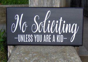 Decorative no soliciting signage lets unwanted visitors know you are not interested but you are open to neighborhood children fundraisers. 