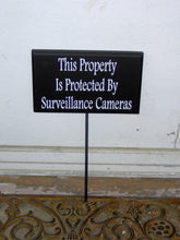 Load image into Gallery viewer, This Property Protected By Surveillance Cameras Wood Vinyl Stake Sign Garden Sign Yard Art Security Warning No Trespasing Private Property - Heartfelt Giver