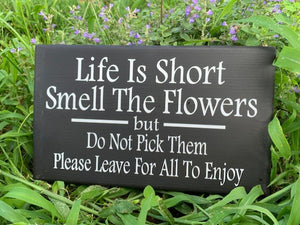 Yard sign for your garden.  Let others know it is ok to smell the flowers but not ok to pick them.