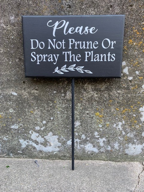 Do Not Prune or Spray The Plants sign on a post for your yard 