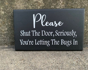Doo Sign to ask other to shut the door you're letting in the bgs